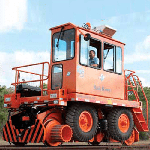 A picture of the RK290-G6 railcar mover, being driven by an operator.
